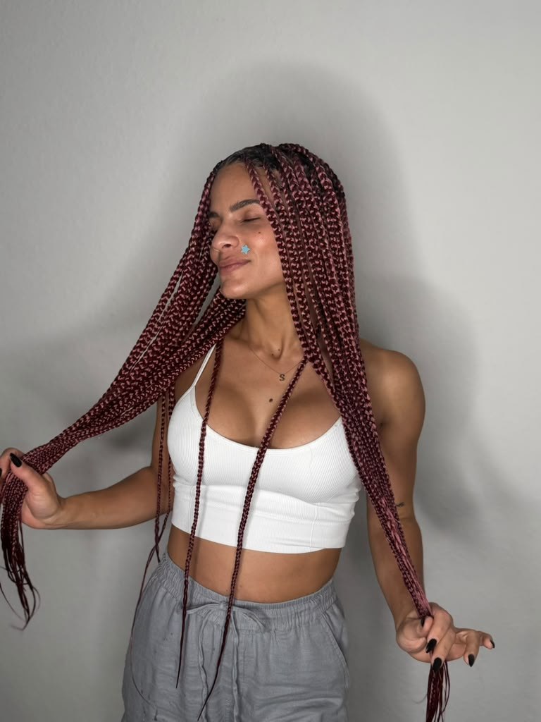 Long burgundy two-tone box braids, a full-day install at Beauty by Yulis
